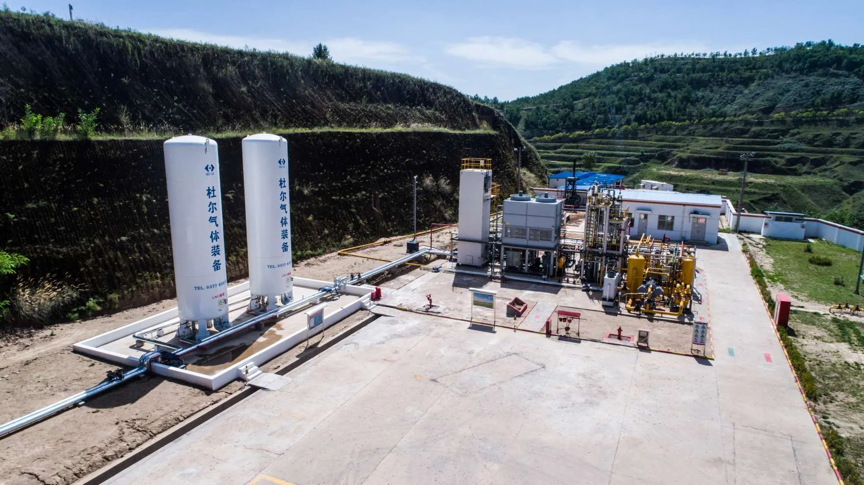 Aerial view of natural gas processing equipment in an engineering environment