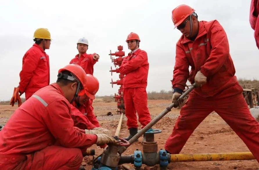 Field team working with natural gas equipment